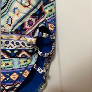 One-piece swimsuit with low back and leg cutouts